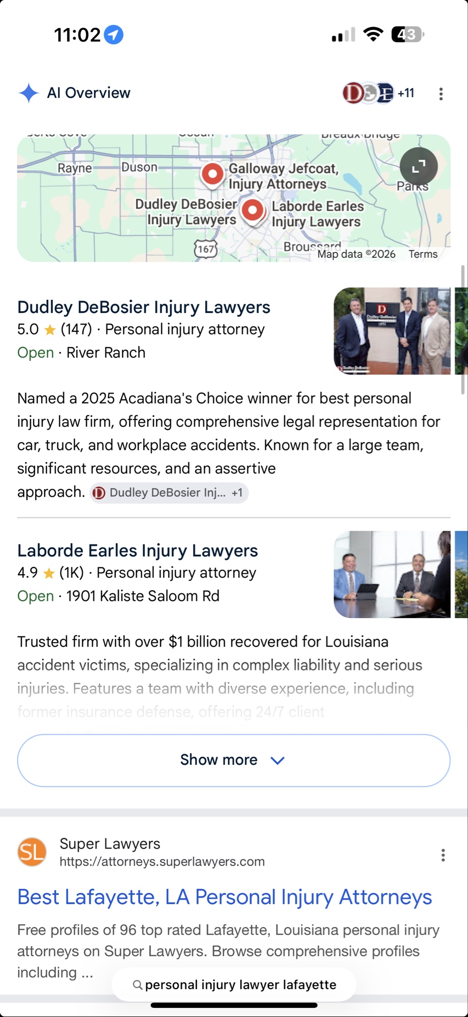 Google AI Overview on mobile answering personal injury lawyer Lafayette with a synthesized recommendation paragraph and source citations